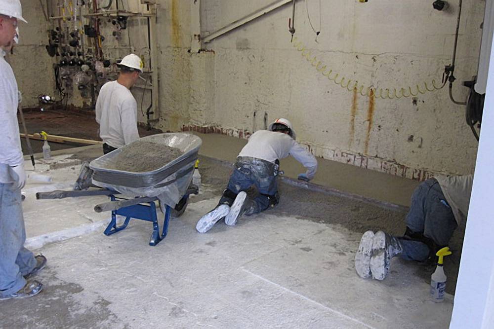 High-build epoxy mortar was selected for its excellent durability, chemical resistance and ability to fill in low spots.