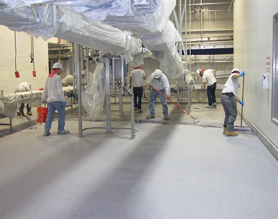 Fast curing MMA quartz seamless flooring system is applied.