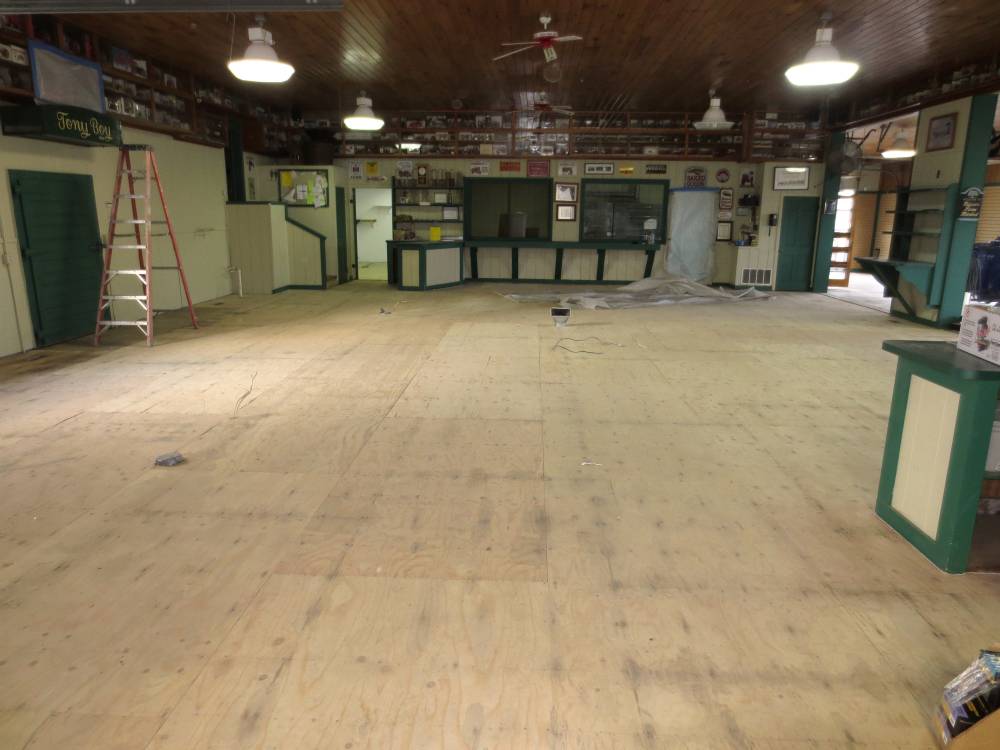 Wooden sub-floor sanded and leveled.