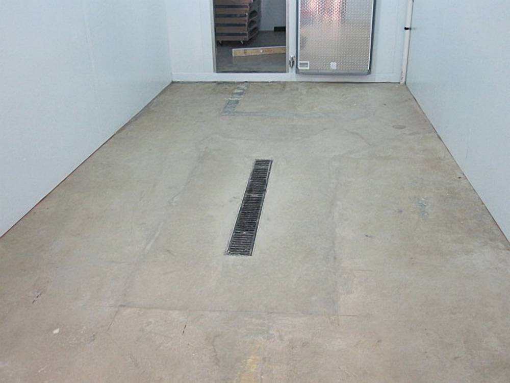 Existing floor in refrigerated storage was failing.