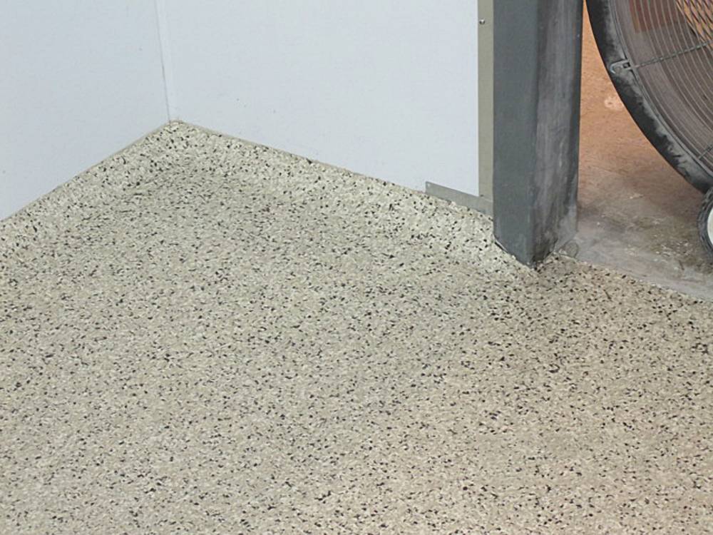Sloped edges provide better drainage and keep spills from seeping under walls.